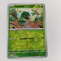 Pokemon Surging Sparks Capsakid Reverse Holo Common Card 012/191 NM - Image 1