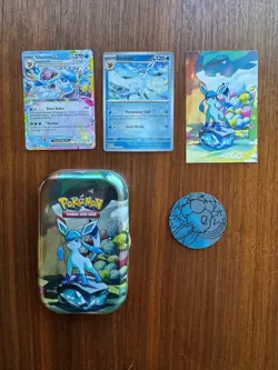 Prismatic Evolutions Glaceon tin + NM Holos & Promo Card & Coin - Image 1
