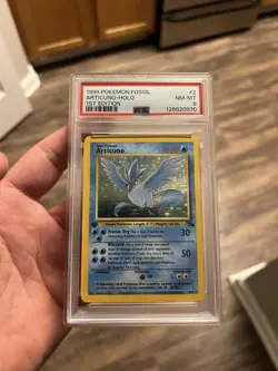 1999 POKEMON FOSSIL 1ST EDITION #2 ARTICUNO HOLO PSA 8 - Image 1
