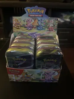 Pokemon TCG Prismatic Evolutions Mini Tins Set of 8, Sealed with Display Box - Image 1