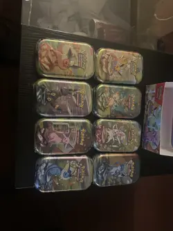 Pokemon TCG Prismatic Evolutions Mini Tins Set of 8, Sealed with Display Box - Image 2