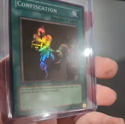 YUGIOH CONFISCATION MRL-038 1ST SUPER NM - Image 1