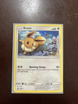 Eevee SM235 NM Black Star Promo Cosmos Holo Near Mint Foil Pokemon Card SM 235 - Image 1
