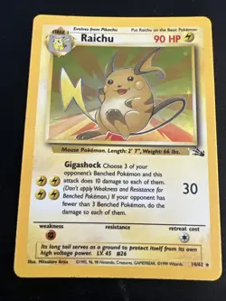 1999 Fossil Vintage Pokemon 2 Card Lot: Holo Lapras 10/62 & Holo Raichu 14/62 - Image 2