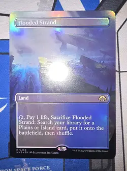 MTG - Modern Horizons 3 - Flooded Strand (Borderless) #0353 - Near Mint Foil - Image 1