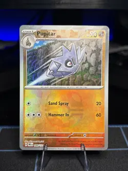 Pokemon TCG Pupitar Master Ball Pattern Holo Card 048/131 Prismatic Evolutions - Image 1