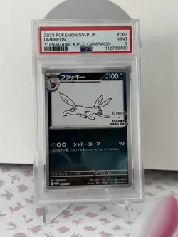 2024 POKEMON JAPANESE SV-P PROMO YU NAGABA X POKEMON CARD #067 UMBREON PSA 9 - Image 1
