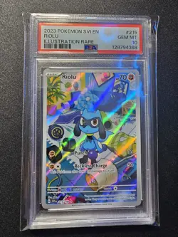 2023 POKEMON SVI EN-SCARLET & VIOLET ILLUSTRATION RARE #215 RIOLU PSA 10 - Image 1