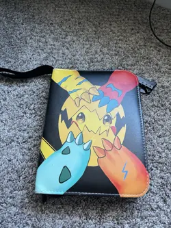 Pokemon Card Binder With 100 Cards And Can Hold Over 100 - Image 1