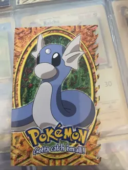 Dratini #147 10 OF 12 - Embossed Die-Cut - BLUE LOGO - TOPPS POKEMON CARD - Image 1