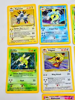 Pokemon Base Set 2 Holo "Alakazam, Poliwrath, Pidgeot, Scyther, etc." (H Played) - Image 5