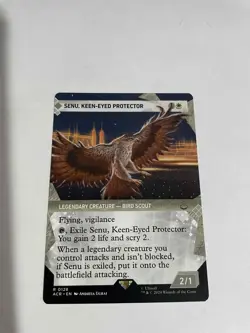 Senu, Keen-Eyed Protector (Showcase) Universes Beyond: Assassin's Creed Regular - Image 1