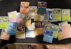Pokemon Prismatic Evolutions English Holofoil Bulk Card Lot 25 Holos/Reverse - Image 1