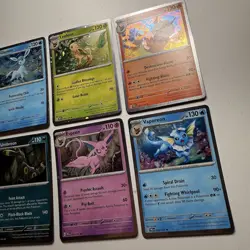 Pokemon TCG Prismatic Evolutions Costco Mini Tin Cosmos Promo Cards Set Of 8 NM - Image 2