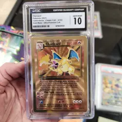 CGC 10 Gem Mint Charizard 4/102 Celebrations UPC Gold Metal Pokemon Card - Image 1