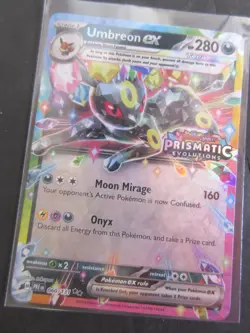 2025 POKEMON SURPRISE BOX EXCLUSIVE #060 UMBREON CARD - Image 1