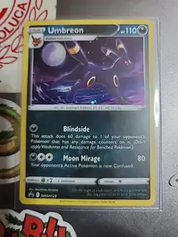 Umbreon SWSH129 SWSH: Sword & Shield Promo Cards Holo with holo swirl - Image 1
