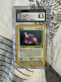 Pokemon Ditto Unlimited Fossil Card 3/62 CGC 8.5 Holo - Image 1