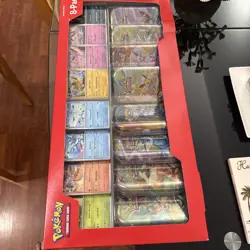 Pokemon Prismatic Evolutions 8 Mini-Tins with Promo Cards Costco Pack - New - Image 1