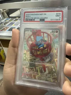 2025 POKEMON MEP EN-ME BLACK STAR PROMO #010 RIOLU PSA 9 TCG CARD - Image 1