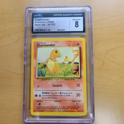 1999 POKEMON BASE SET #46 CHARMANDER CGC 8 - Image 1