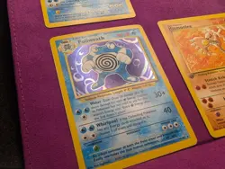 Holo Poliwrath and 1st Edition Hitmonlee Fossil Lot Pokemon Cards - Image 1