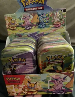Pokemon TCG Prismatic Evolutions Mini Tin Full 8-Tin Set - Image 1