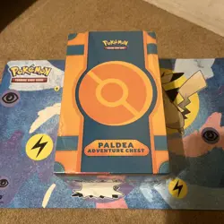 Pokemon TCG: Paldea Adventure Chest (7 Foil Promo Cards & 6 Booster Packs - Image 1