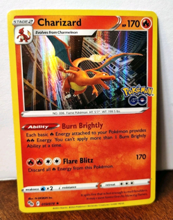 POKEMON CHARIZARD 010/078 HOLO RARE POKEMON GO NM NEAR MINT - Image 1
