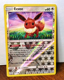 POKEMON EEVEE 101/149 REVERSE HOLO SUN AND MOON LP - Image 1