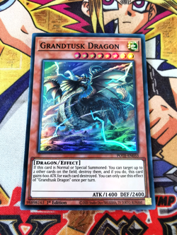 Grandtusk Dragon pote-en033 1st Edition (NM+) Super Rare Yu-Gi-Oh! - Image 1