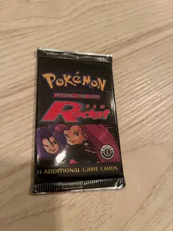 Wizards of the Coast Pokemon TCG Team Rocket Booster Pack - 11 Cards 742818061742 - Image 1