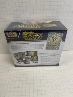 Pokemon Surging Sparks ETB Pokemon Center Exclusive Edition New Factory Sealed - Image 2