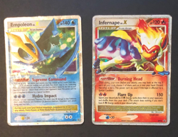 Lot of 2, Pokemon TCG Damage Diamond and Pearl Promos Ink On Back - Image 1