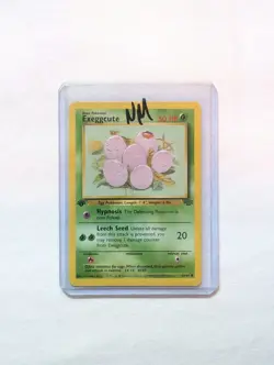💎NM 1st First Edition Exeggcute #52/64 Jungle Set Pokemon Card 1999 WOTC TCG - Image 1