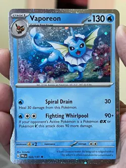 POKEMON VAPOREON 022/131 RARE COSMOS HOLOFOIL PRISMATIC EVOLUTIONS NM - Image 1