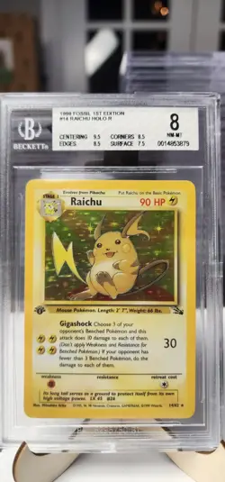 Beckett 8 Near Mint 1st Edition Raichu Holo 14/62 Pokemon 1999 Fossil - Image 1