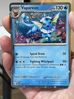 POKEMON VAPOREON 022/131 RARE COSMOS HOLOFOIL WITH SWIRL PRISMATIC EVOLUTIONS - Image 1