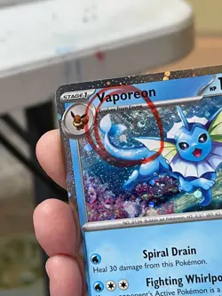 POKEMON VAPOREON 022/131 RARE COSMOS HOLOFOIL WITH SWIRL PRISMATIC EVOLUTIONS - Image 2