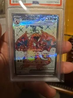 PSA 10 Charizard ex 215/197 Obsidian Flames Holo Pokemon Card - Image 2