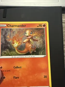 Charmander SWSH092 Holofoil Black Star Promo Card NM Condition - CHEEK SWIRL - Image 1