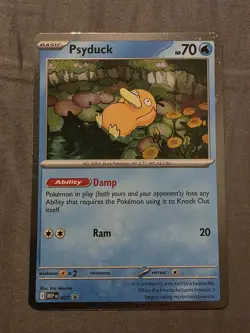 Pokemon TCG Psyduck 007 Mega Evolution Black Star Promo Cosmos Holo *Near Mint* - Image 1