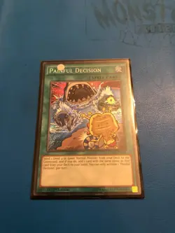YUGIOH Secret Rare Painful Decision DOCS-EN065/MP16-EN151 Mixed Editions - Image 1
