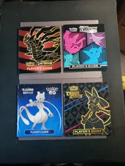 Mixed Pokemon etb Guide Book (4) Lot - Image 1