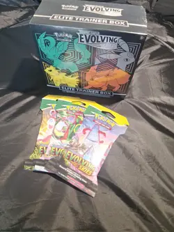 Pokemon TCG Sword & Shield Evolving Skies Elite Trainer And 3 Pack Bundle - Image 1