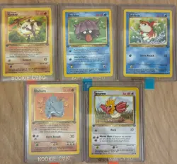 1st Edition Pokemon Card Lot WOTC Jungle Fossil Rhyhorn Spearow Mankey Shellder - Image 1