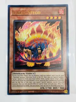 YuGiOh! - Jurrac Stego BLMM-EN017 Ultra Rare 1st Edition Near Mint - Image 1