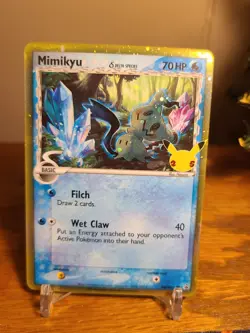 Pokemon Card Mimikyu SWSH136 Delta Species 25th Celebrations Black Star Promo - Image 1