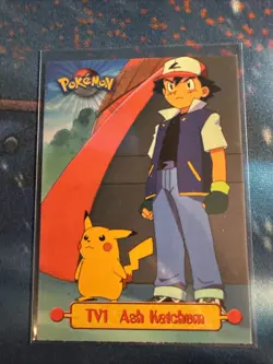 1999 Topps Pokemon TV Animation Series 1 #TV1 Ash Ketchum Black Logo 1st Edition - Image 1