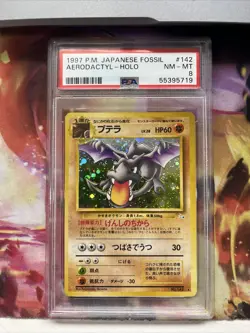 Japanese Aerodactyl 1997 Pokemon Fossil Rare Holo #142 PSA 8 - Image 1